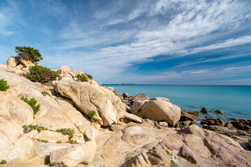 junipers, granite rocks and crystal clear water in Sardinia