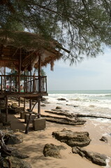 Rocky resort beach during off-season. Sunny relax day. Koh Lanta island. Thailand