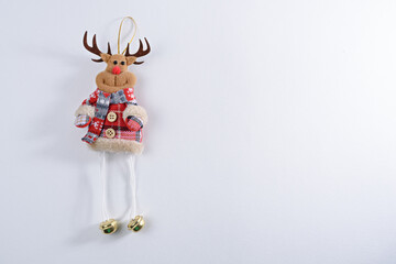 Christmas toy deer on white background, Christmas stuffed toys, copy space