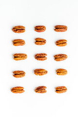 Pecan nuts pattern. Food background, top view