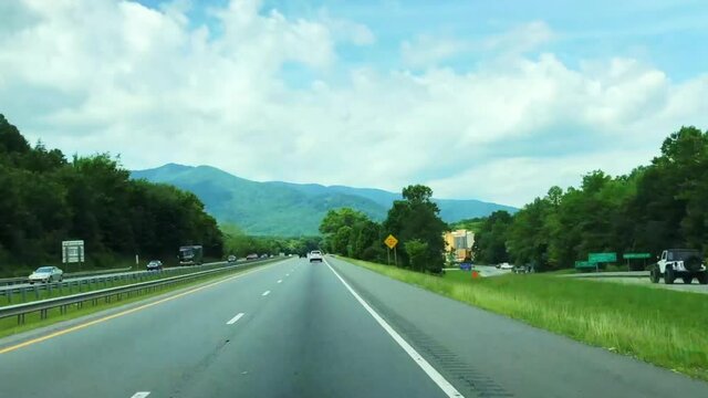 Timelapse of fast moving car on the road in north Carolina