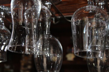 glasses in the bar hang upside down