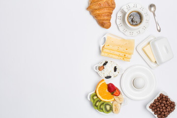 Obraz na płótnie Canvas Black coffee, croissant cheese, eggs and butter to breakfast