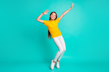 Obraz premium Full body photo of cool kid girl dancing wear casual style clothes isolated over turquoise color background