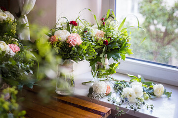 Bouquets of flowers in a floristic studio (flower shop)