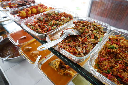 A buffet or buffets is a way of serving food at a party or restaurant by placing the food on a long table and visitors taking the desired menu themselves, Selective Focus      