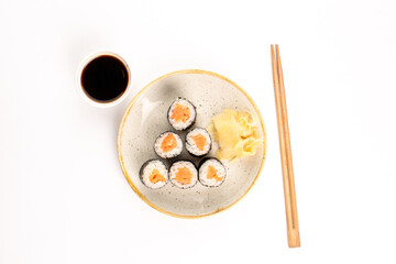 Roll with salmon on white background