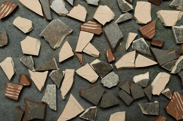 Top view of pieces of broken tiles as a background, mosaic