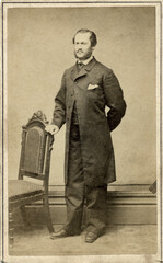 1860's Civil War Era Carte De Vista CDV Photo Handsome Young Man Standing with Long Frock Coat - obrazy, fototapety, plakaty