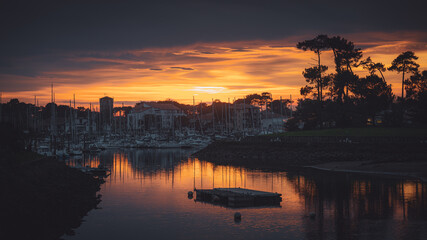 Fototapeta na wymiar Capbreton Harbor with a beau sunset in France 