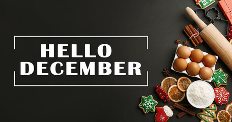 Hello December greeting card. Flat lay composition with homemade Christmas cookies and ingredients on black table