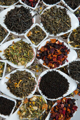 Assortment of dry tea. Various kinds of tea isolated on white.Different kinds of tea leaves. Tea...