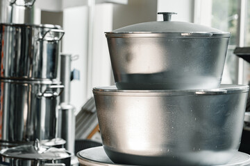 New industrial cooking pots on proffesional kitchen