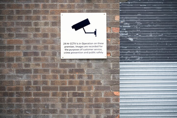CCTV in operation 24 hours premises protected sign