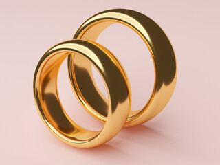 Two wedding gold rings lie next to each other. Love concept
