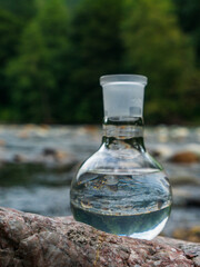 Glass flask with clean drinking water.