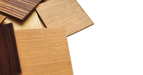 multi texture and color satcked of wooden veneer laminated samples in square shape with space for text. samples of light oak wood and dark cherry wood isolated on white background with clipping path.
