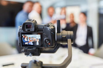 Video camera recording a company party