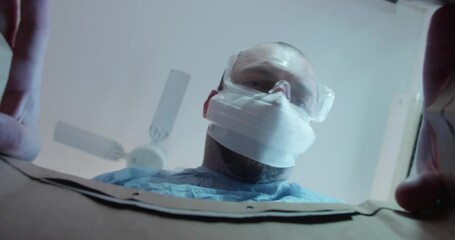 Doctor searching for his instruments