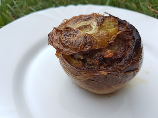 a sephardic food. Stuffed green tomato