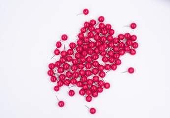 Group of red paper pin put on background,Thumbtack