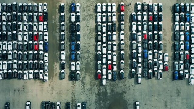 New cars in car factory parking lot