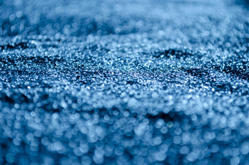 Obraz premium Dark blue abstract bokeh background.