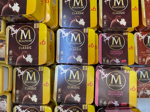 Viersen, Germany - July 9. 2020: Closeup of isolated boxes frozen Magnum ice cream in cooling counter