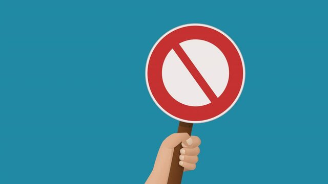Hand raising a prohibition sign on a blue background