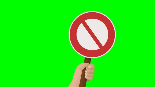 Hand raising a prohibition sign on a green background