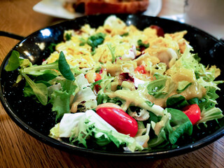 Fresh salad - Delicious fresh salad with tomatoes, lettuce, eggplant, zucchini, cheese, Parma ham and olive oil.