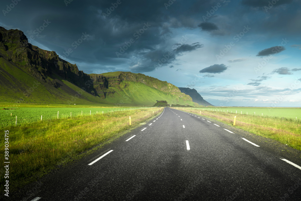 Wall mural icelandic landscape with asphalt road