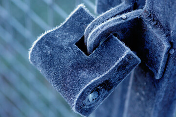 frozen lock on door. frozen padlock. so cold and metal freeze