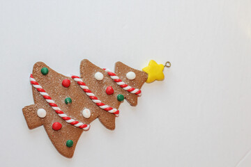 Christmas composition. Christmas gift, pine tree on white background