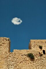 Castle wall and tower with white cloud in Peniscola, Castellon - Spain