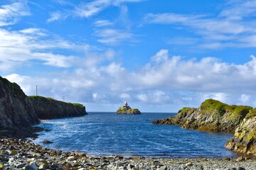 Rocky beach and lonely lighthouse
