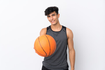 Young Argentinian man over isolated white background playing basketball
