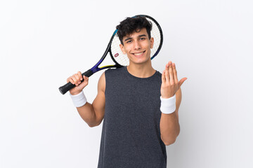 Young Argentinian man over isolated white background playing tennis and doing coming gesture