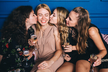 Obraz premium Photo session of the four sisters. Hen party in the studio. 