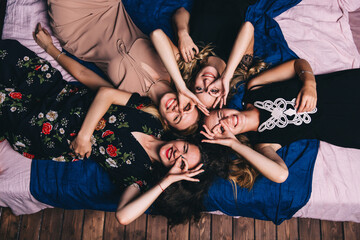 Photo session of the four sisters. Hen party in the studio.

