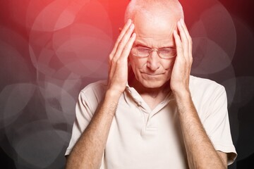 Seniors sad old caucasian man with headache