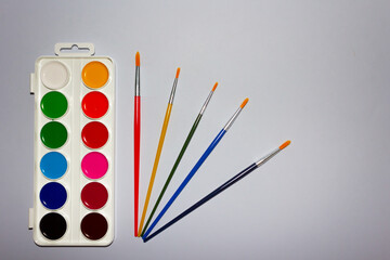 Obraz premium Colourful watercolour paints isolated