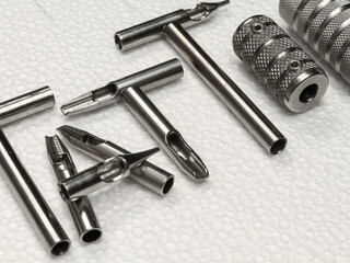 LETTERING TATTOO STEEL TUBES