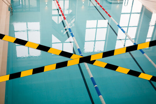 Quarantined public area, swimming pool closed caused by pandemic disease situation. Quarantine globally spread infection. Stop COVID-19 or 2019-ncov coronavirus line restricted areas, no entry concept