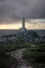 Vertical photo of the Punta Nariga lighthouse in Galicia, Spain