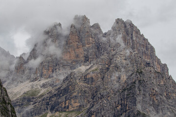 Dolomites, Brenta. Beautiful foggy day in cold summer day in Moveno, Italy