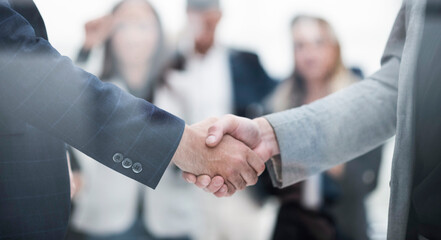 close up. confident business handshake on an office background.