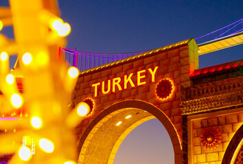 Arch illuminated by light bulbs