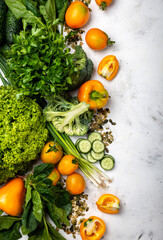 Border from different vegetables and herbs. Top view close-up.