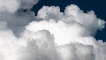 Mountainous Cumulus Clouds Boiling in the Summer Sky